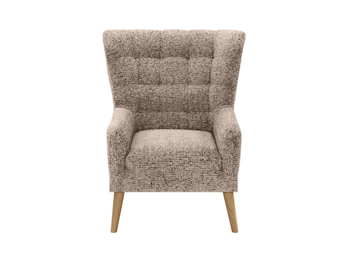 Casey Es Quilted Armchair with high backrest and hardwood legs in modern living room